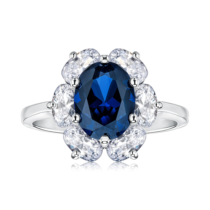 Серебряное кольцо с сапфиром и фианитами. Артикул 00150/12/1/1043