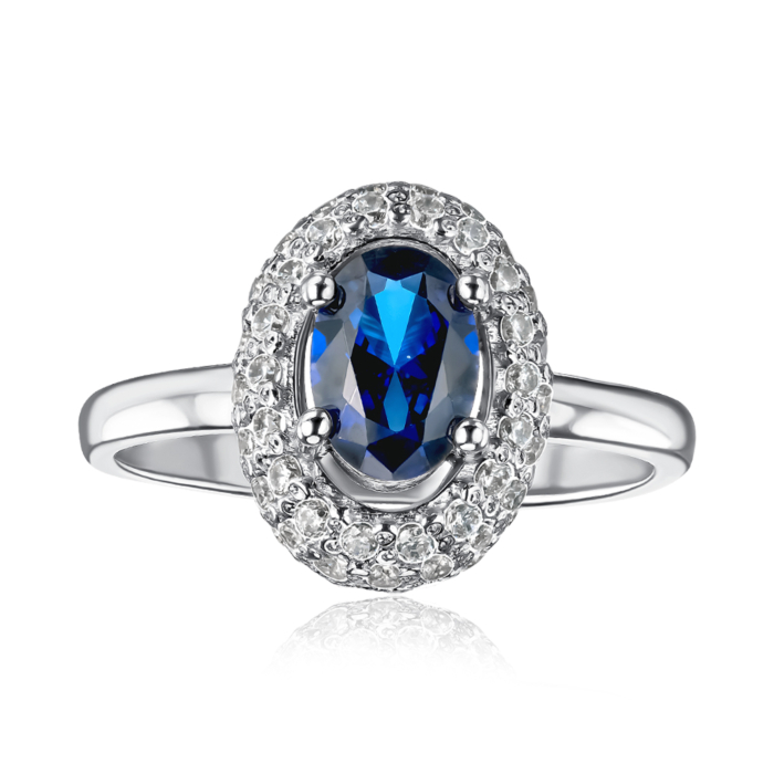 Серебряное кольцо с сапфиром и фианитами. Артикул 00200/12/1/1006