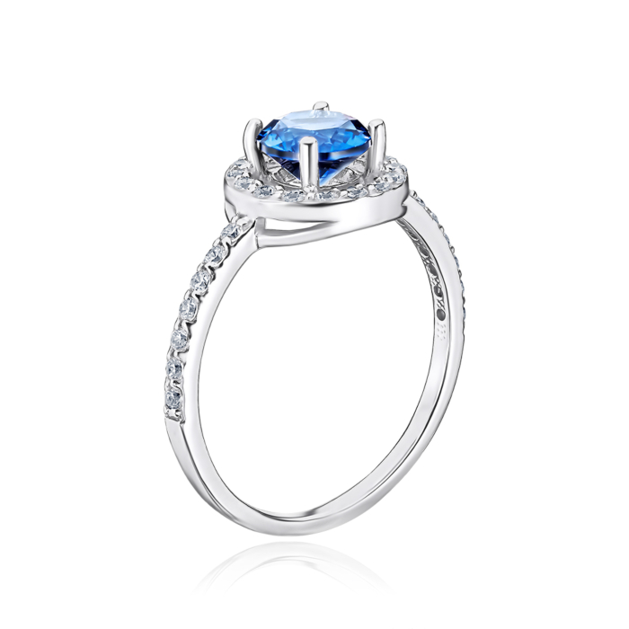 Срібна каблучка з штучним сапфіром та фіанітами 00851/12/1/2204