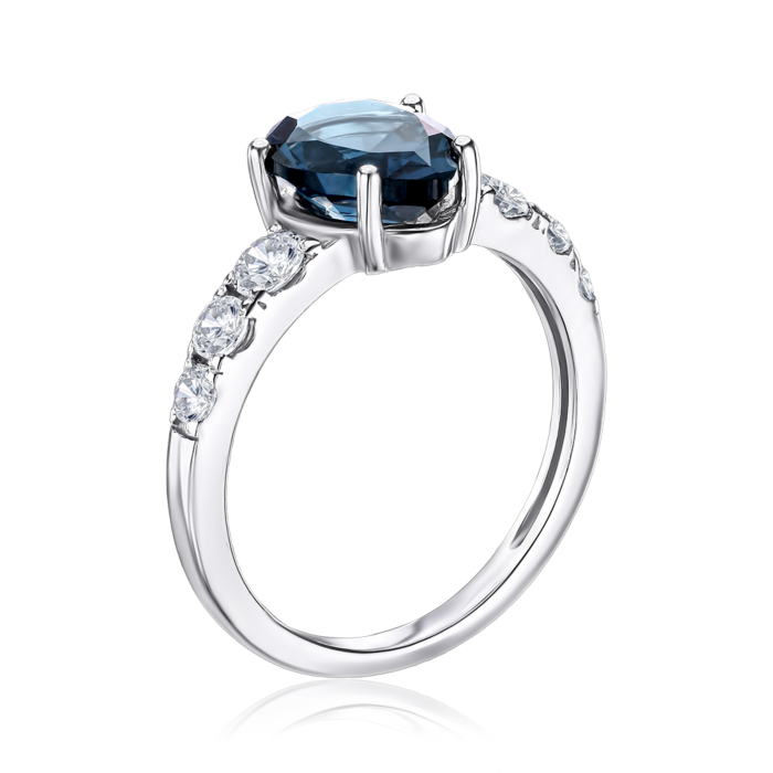 Серебряное кольцо с топазом и фианитами. Артикул 00946/12/1/21304
