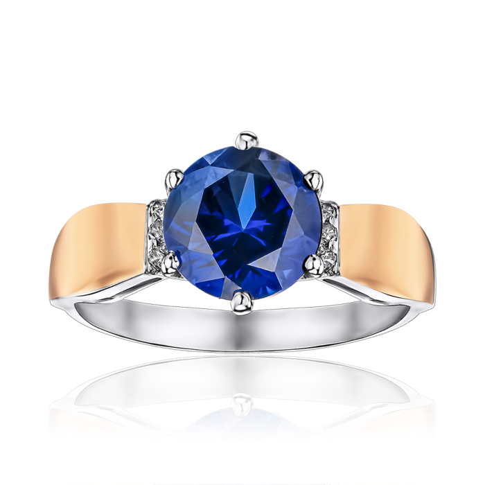 Срібна каблучка з золотими накладками з сапфіром та фіанітами. Артикул 1439/1р-HSPH