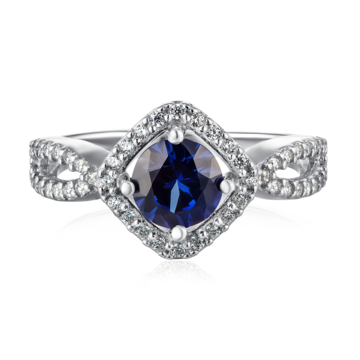 Серебряное кольцо с сапфиром и фианитами. Артикул 1521/1р-HSPH