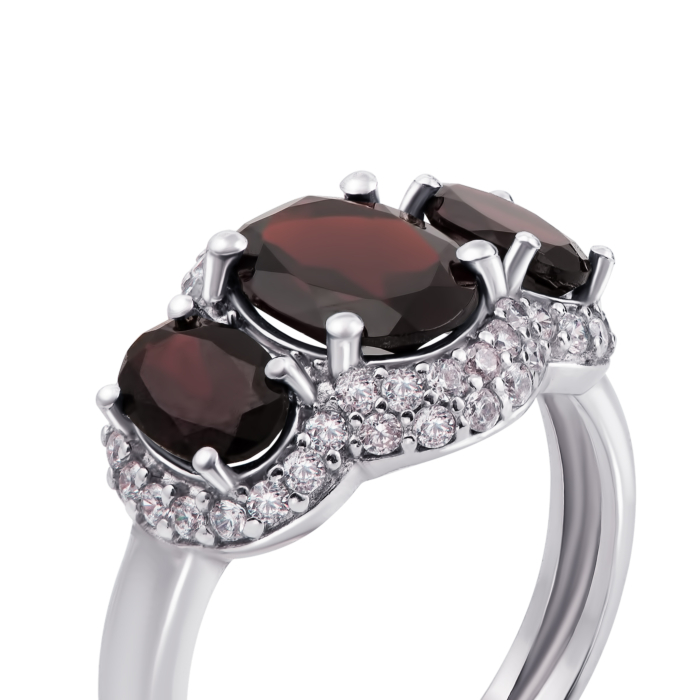 Серебряное кольцо с гранатом и фианитами. Артикул 1658/9р