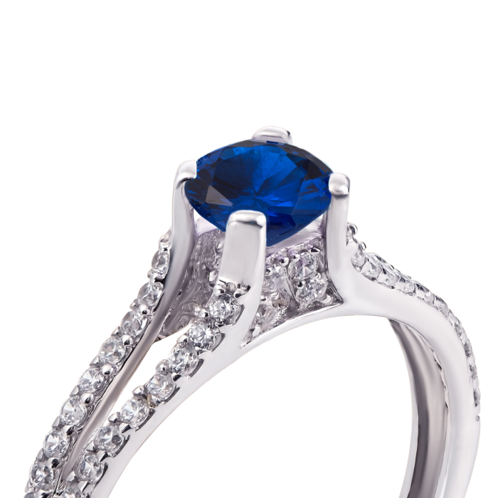 Серебряное кольцо с гидротермальным сапфиром и фианитами. Артикул 1665/9р