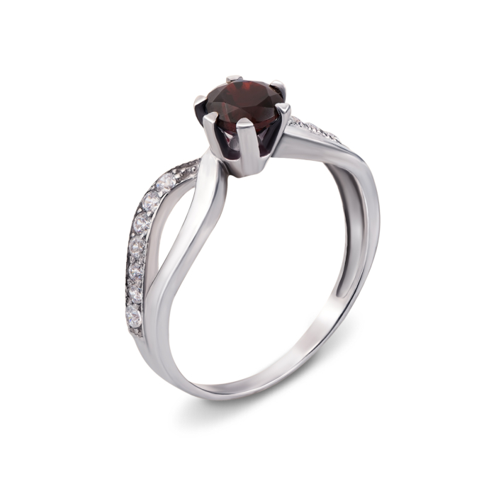 Серебряное кольцо с гранатом и фианитами. Артикул 1667/9р
