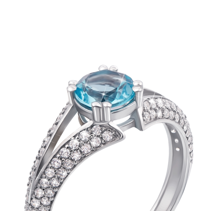 Серебряное кольцо с голубым топазом и фианитами. Артикул 1744/9р