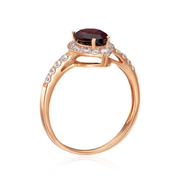 Золотое кольцо с гранатом и фианитами. Артикул 50186/01/0/7231