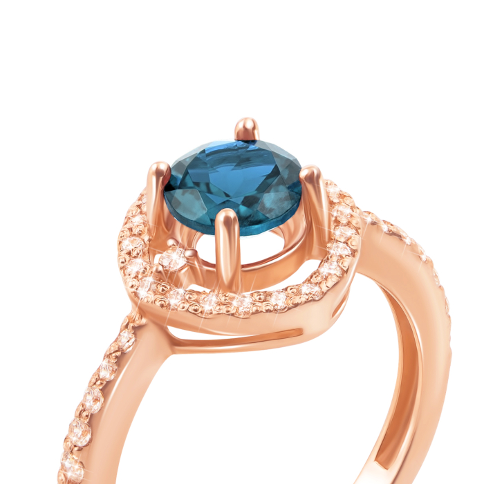 Золотое кольцо с топазом и фианитами. Артикул 530049/топ сп