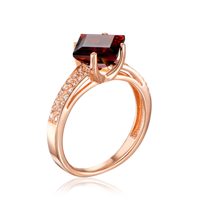 Золотое кольцо с гранатом и фианитами. Артикул 530063/01/0/5146