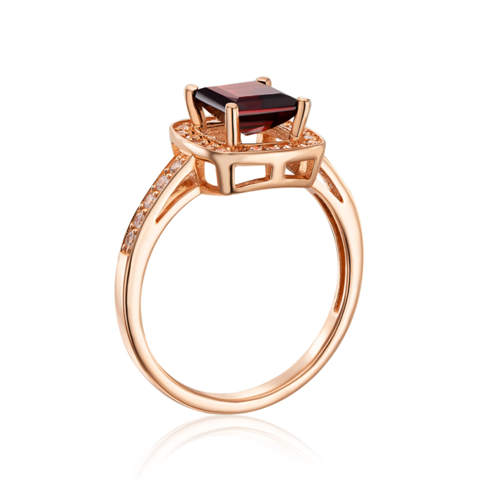 Золотое кольцо с гранатом и фианитами. Артикул 530078/01/0/5317