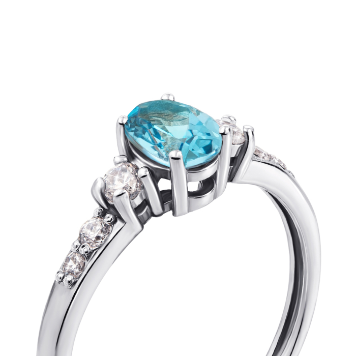 Золота каблучка з топазом і фіанітами. Артикул 530152/б топ с