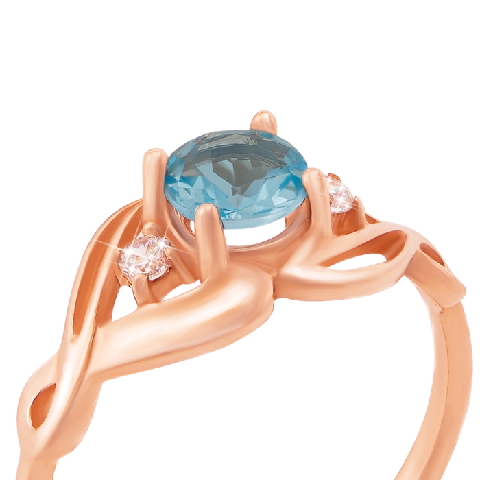 Золота каблучка з топазом і фіанітами. Артикул 530160/топ сп