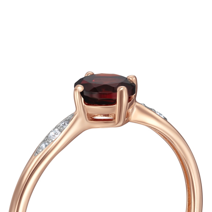 Золотое кольцо с гранатом и фианитами. Артикул 530400/01/1/7298