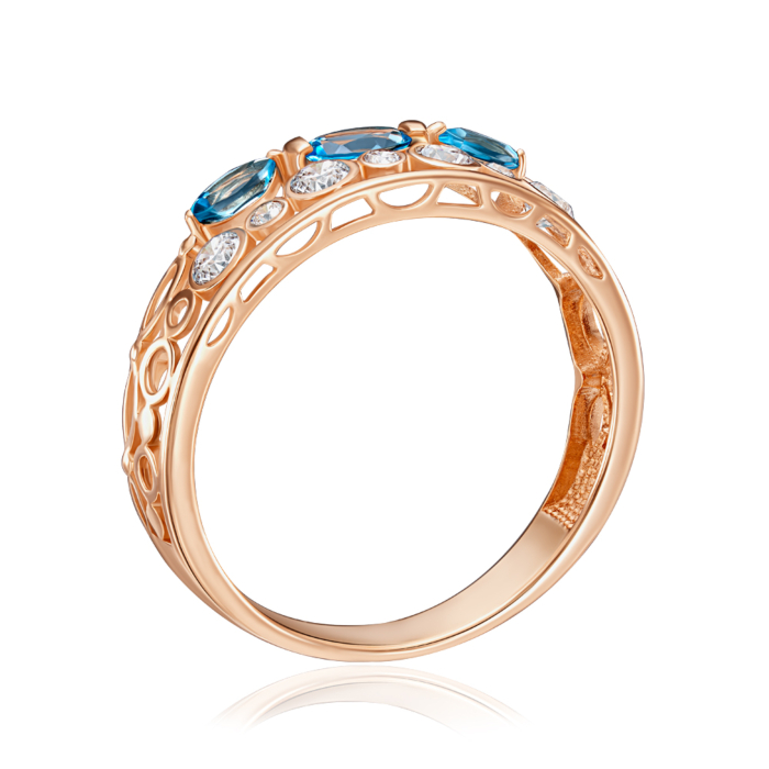 Золота каблучка з топазом та фіанітами. Артикул 530414/01/0/7718