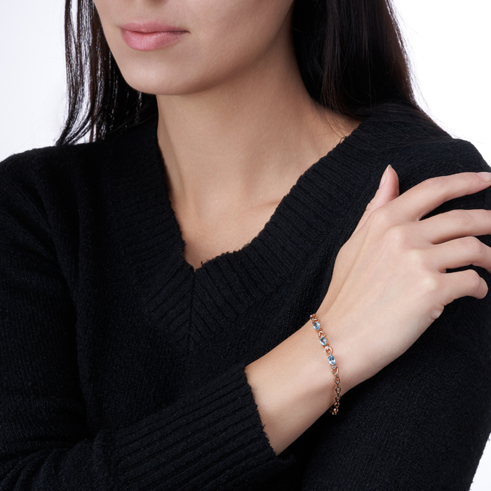 Золотой браслет с топазом swiss и фианитами. Артикул 7114/01/0/5023 (7114/01/0/5241)