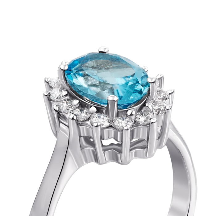 Срібна каблучка з блакитним топазом і фіанітами. Артикул Тд0004/топsw-R