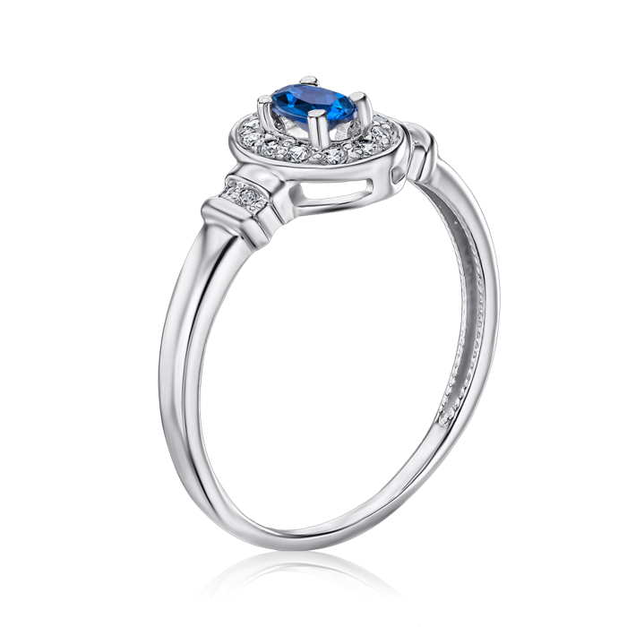 Серебряное кольцо с сапфиром и фианитами. Артикул 530011/12/1/1115