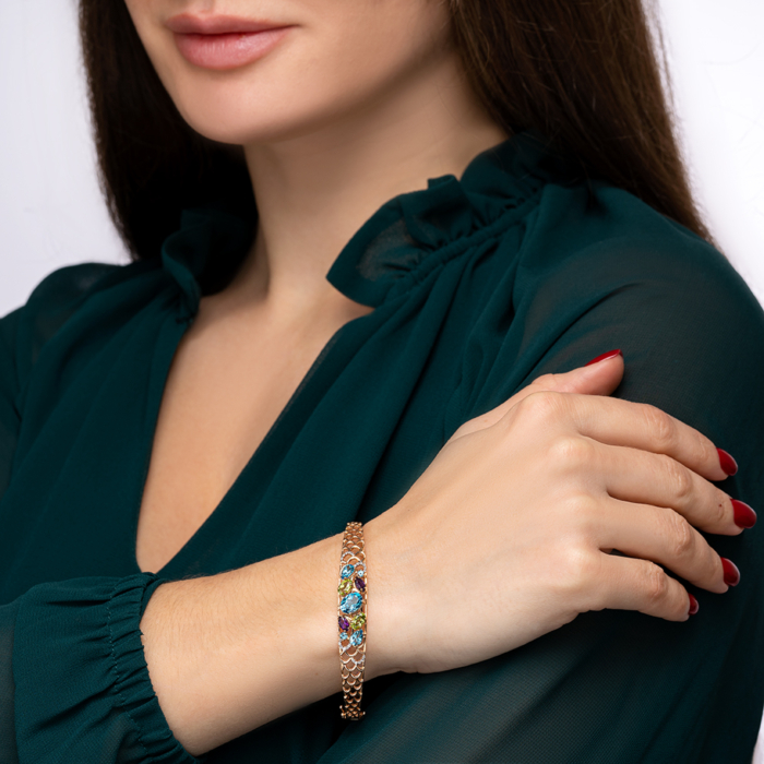 Золотий браслет з міксом каменів. Артикул 7115/01/1/5724