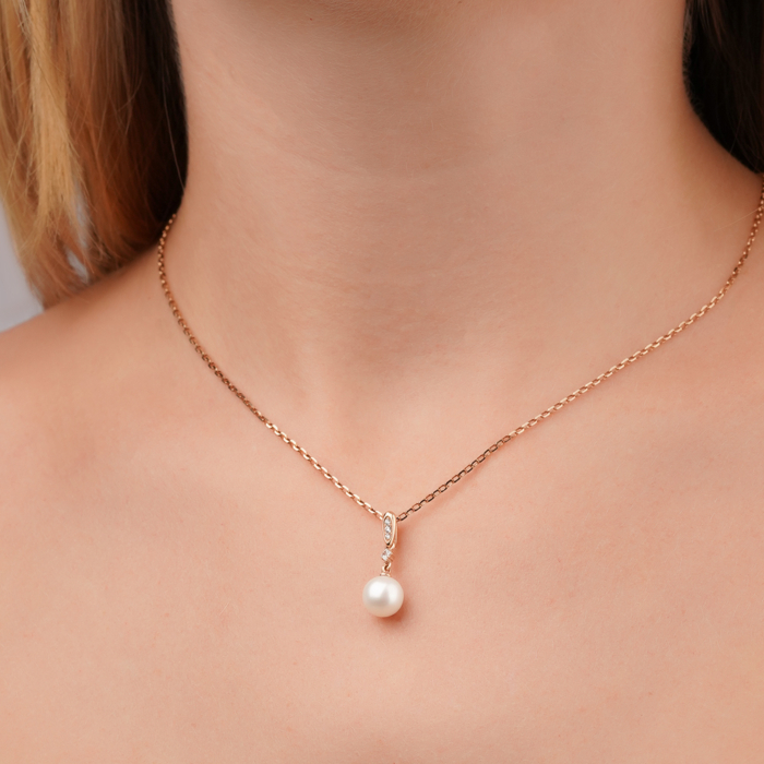 Золота підвіска з перлиною та фіанітами 3190650101-P/01/4936