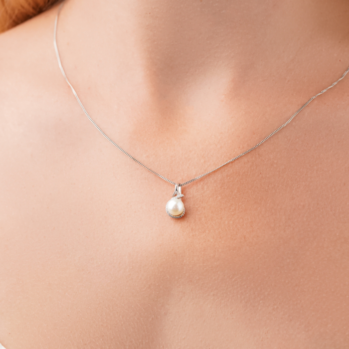 Підвіска з білого золота з перлиною та фіанітами 32209/02/1/2010