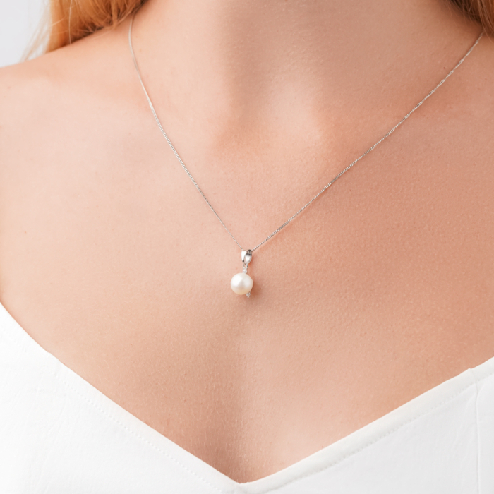 Підвіска з білого золота з перлиною та фіанітами 31376/02/1/1753