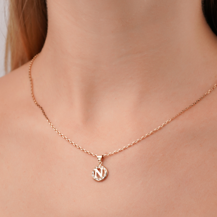 Золота підвіска-літера