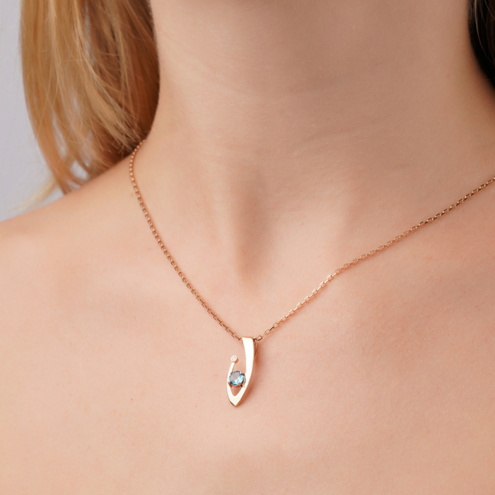 Золота підвіска з топазом та фіанітом 550137/01/1/16257