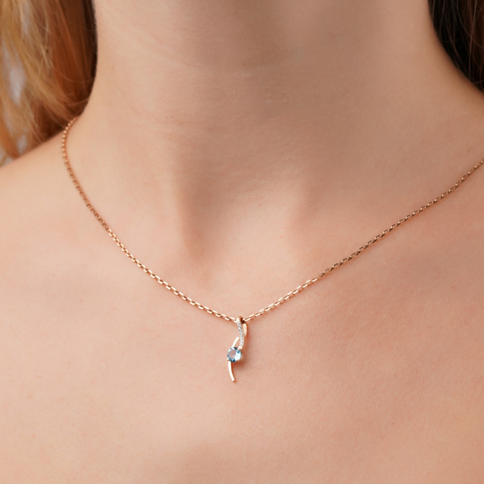 Підвіска з червоного золота з топазом та фіанітами 550133/01/1/7882