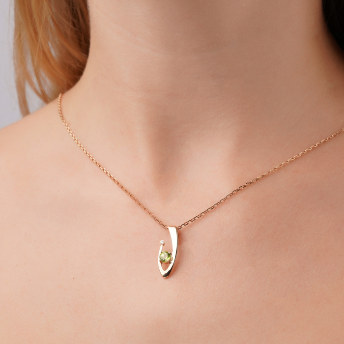 Золота підвіска з хризолітом та фіанітом 550137/01/1/16258