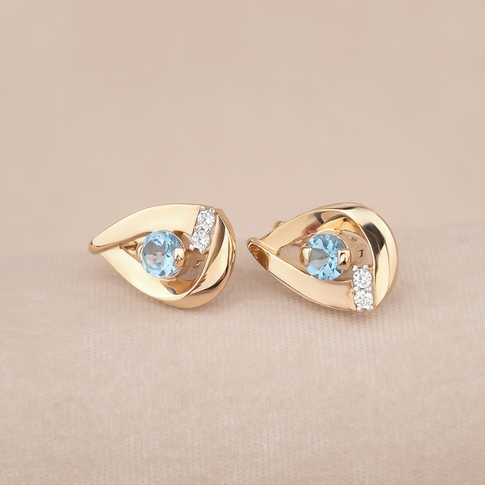 Золоті сережки з топазом та фіанітами 540329/01/1/5200