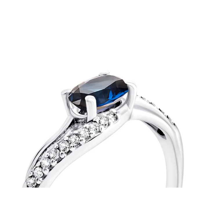 Серебряное кольцо с сапфиром и фианитами. Артикул UG51489/1р-HSPH