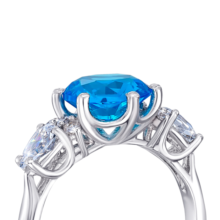 Серебряное кольцо с топазом swiss и фианитами. Артикул 1964/9р-QSWB
