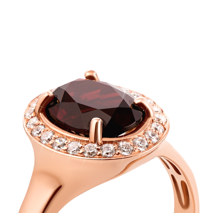 Золотое кольцо с гранатом и фианитами (50191/01/0/5075)