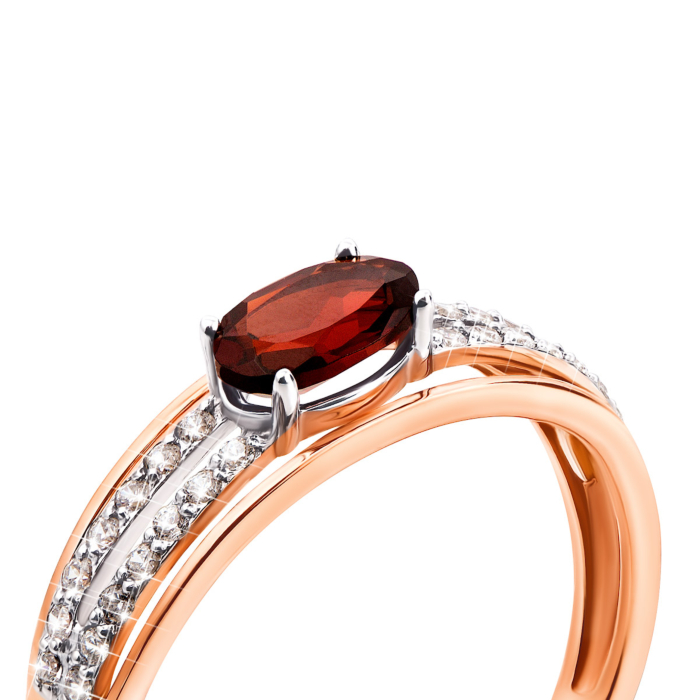 Золота каблучка з гранатом і фіанітами (530155/01/1/5027)