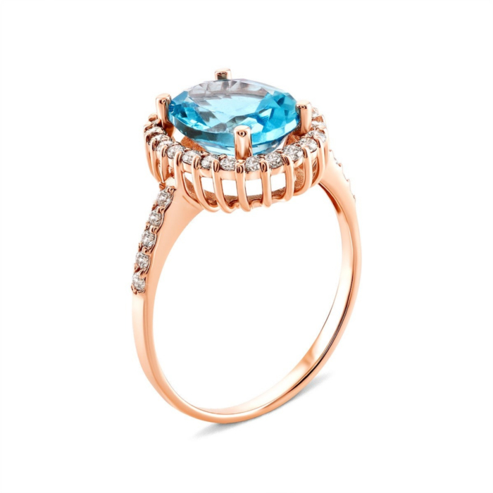 Золота каблучка з топазом і фіанітами. Артикул UG5КД4036топ