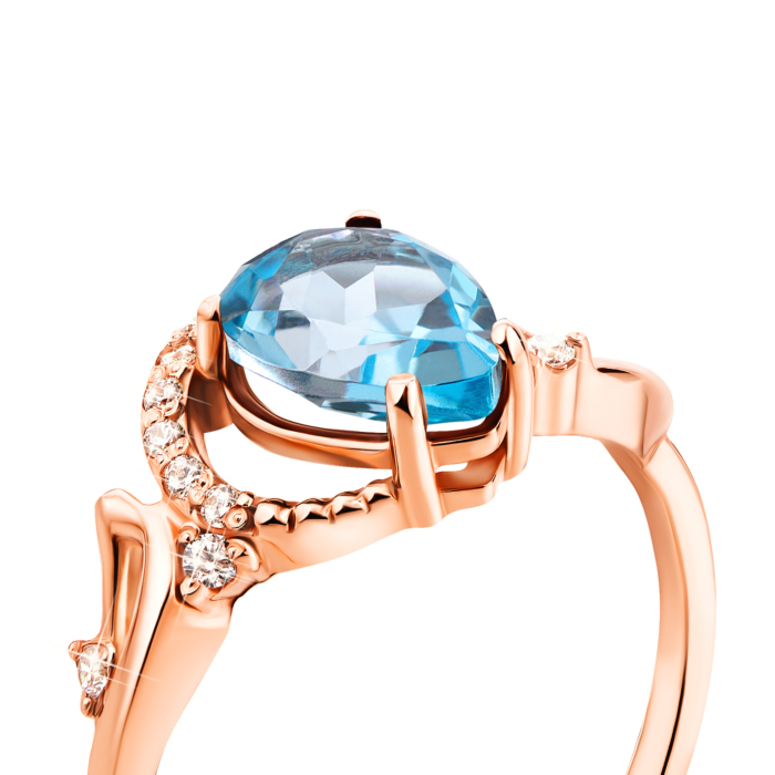 Золота каблучка з топазом swiss і фіанітами (530123/01/0/5184 (530123/тп sw)