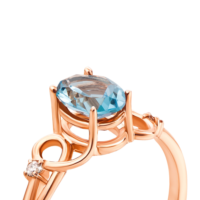 Золота каблучка з топазом swiss і фіанітами (530141/01/0/5053)