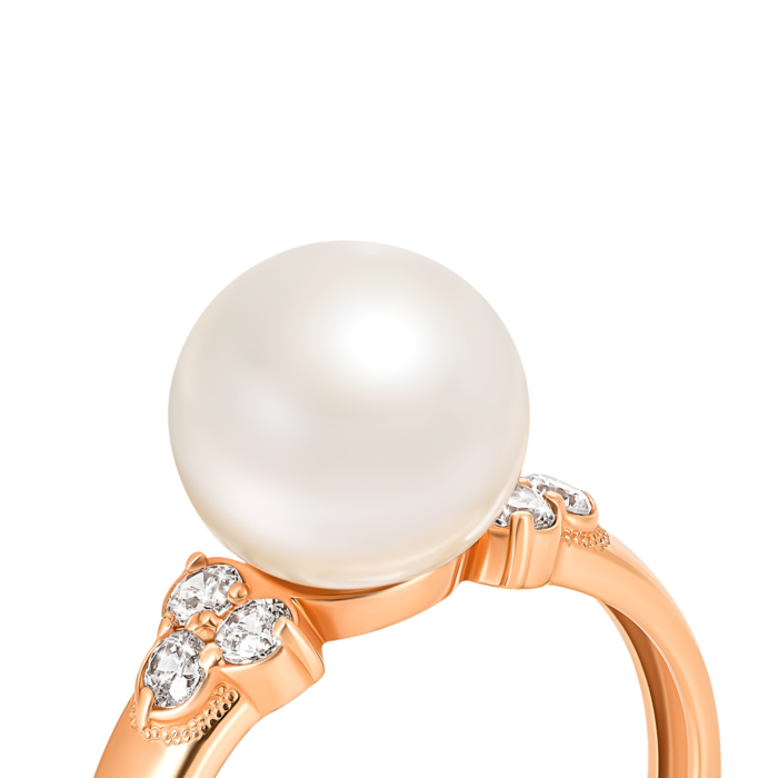 Золотое кольцо с жемчугом и фианитами. Артикул UG512629/01/0/647 (12629 сп)