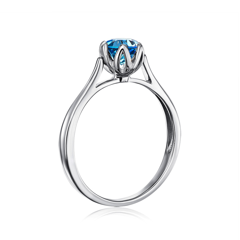 Золотое кольцо с голубым топазом. Артикул 530110/б топ